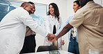 People, diversity or huddle with hands together for medical mission, meeting or unity in office. Happy group, employees or healthcare workers piling with stack in solidarity for community campaign