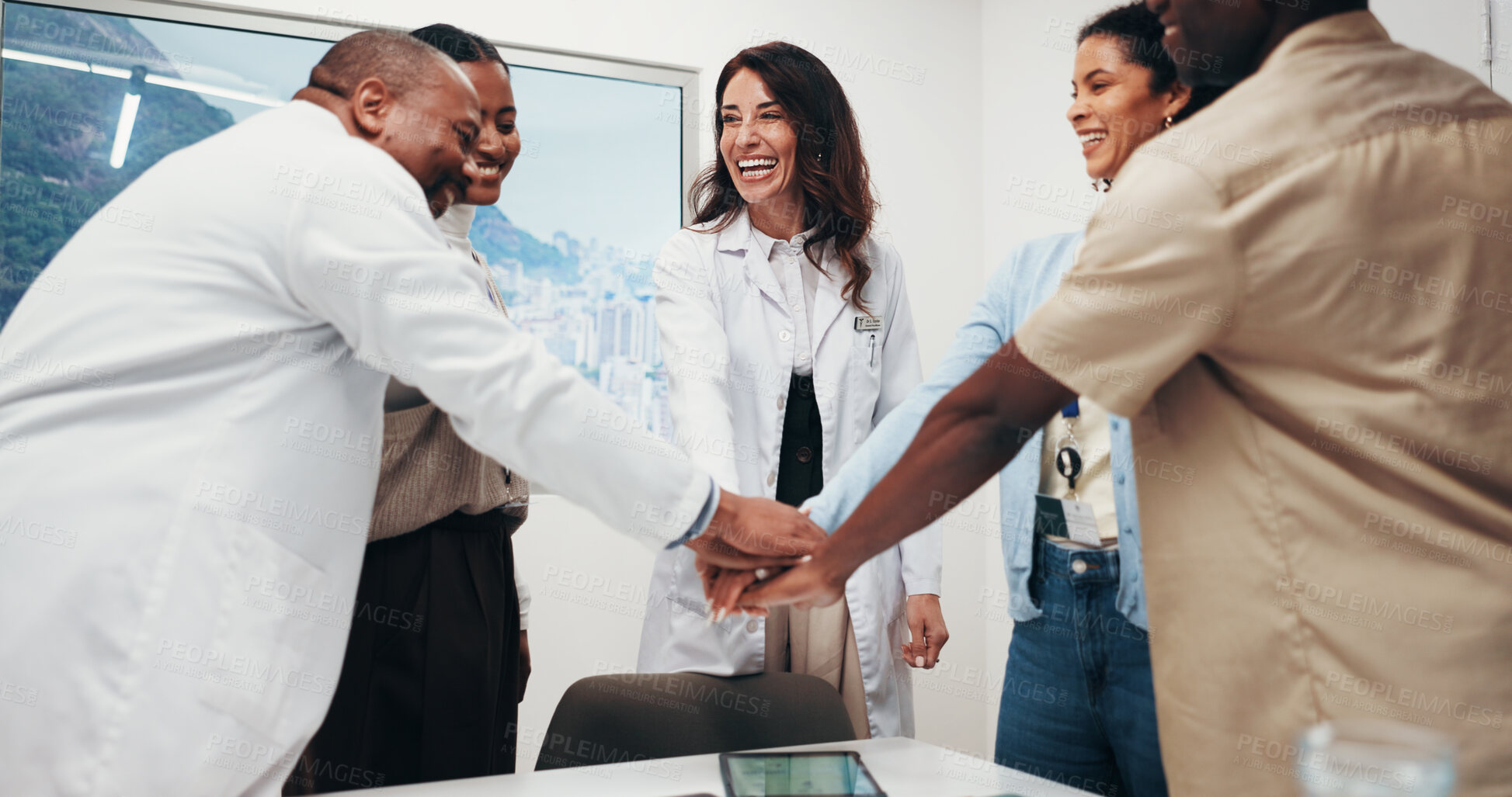 Buy stock photo People, diversity or huddle with hands together for medical mission, meeting or unity in office. Happy group, employees or healthcare workers piling with stack in solidarity for community campaign