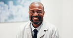 Healthcare, doctor and black man in clinic with smile, wellness service and career experience. Mature person, medical expert and happy professional in hospital with integrity, portrait and confidence