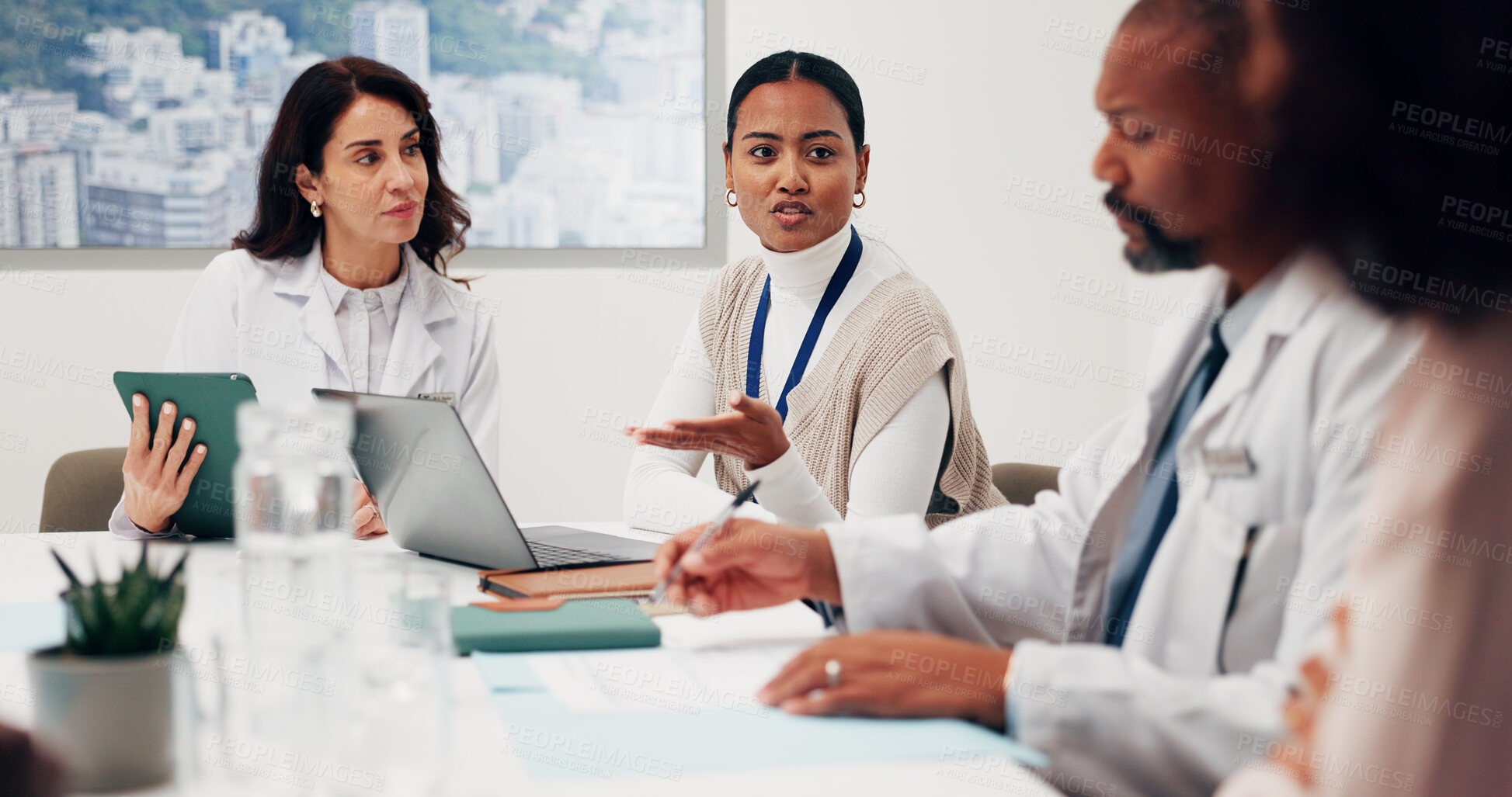 Buy stock photo Medical student, discussion and presentation with laptop in office, research and explain case study. Healthcare, team and people with technology, talking and treatment plan on website in meeting