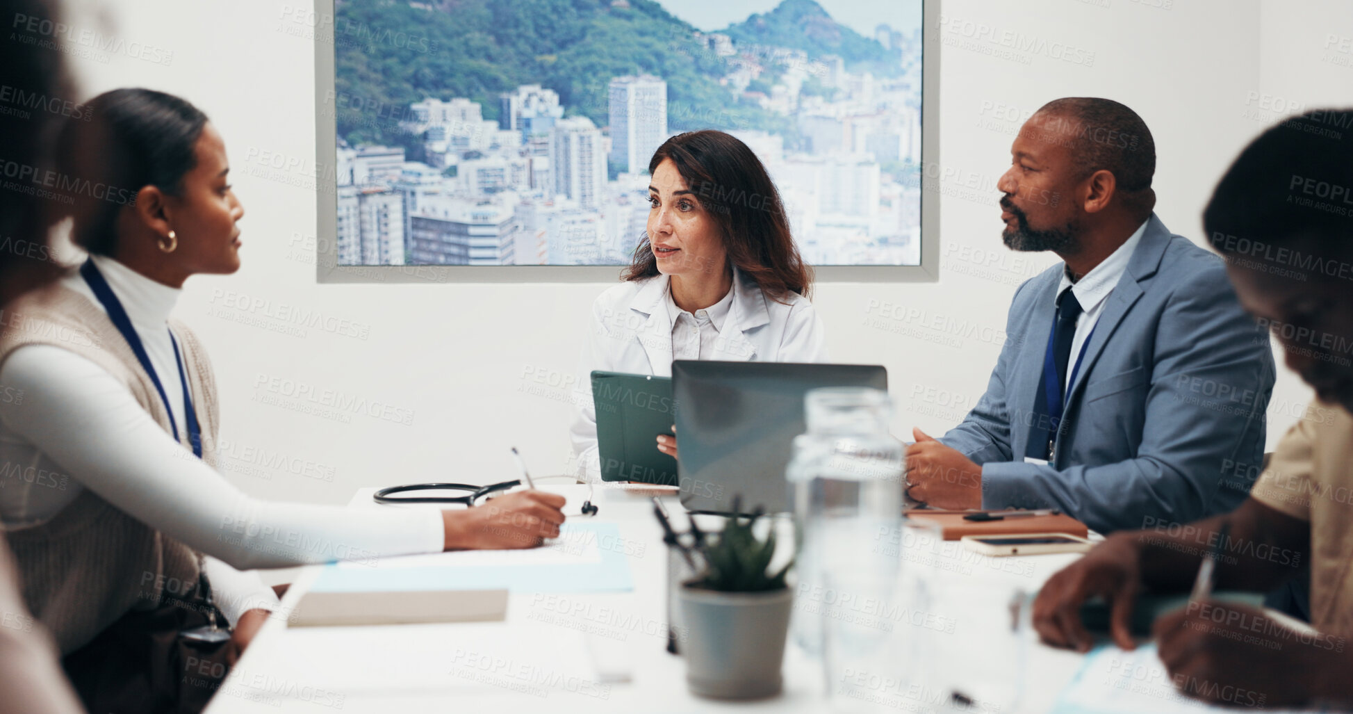 Buy stock photo Doctor, meeting and people with tablet, talking or healthcare research with colleagues in boardroom. Health, team and group with technology, advice and collaboration with treatment plan on website