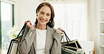 Smile, woman and bag in home for shopping, clothing haul and fashion purchase for retail therapy. Portrait, mature person and parcel at house with new outfit, collection and sale for wardrobe restock