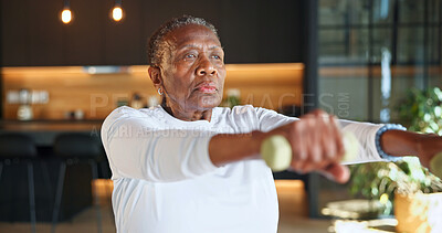 Buy stock photo Workout, dumbbells and elderly woman in home for muscle growth, osteoporosis prevention or health. Weightlifting, black person and raises for wellness, strength development or retirement fitness