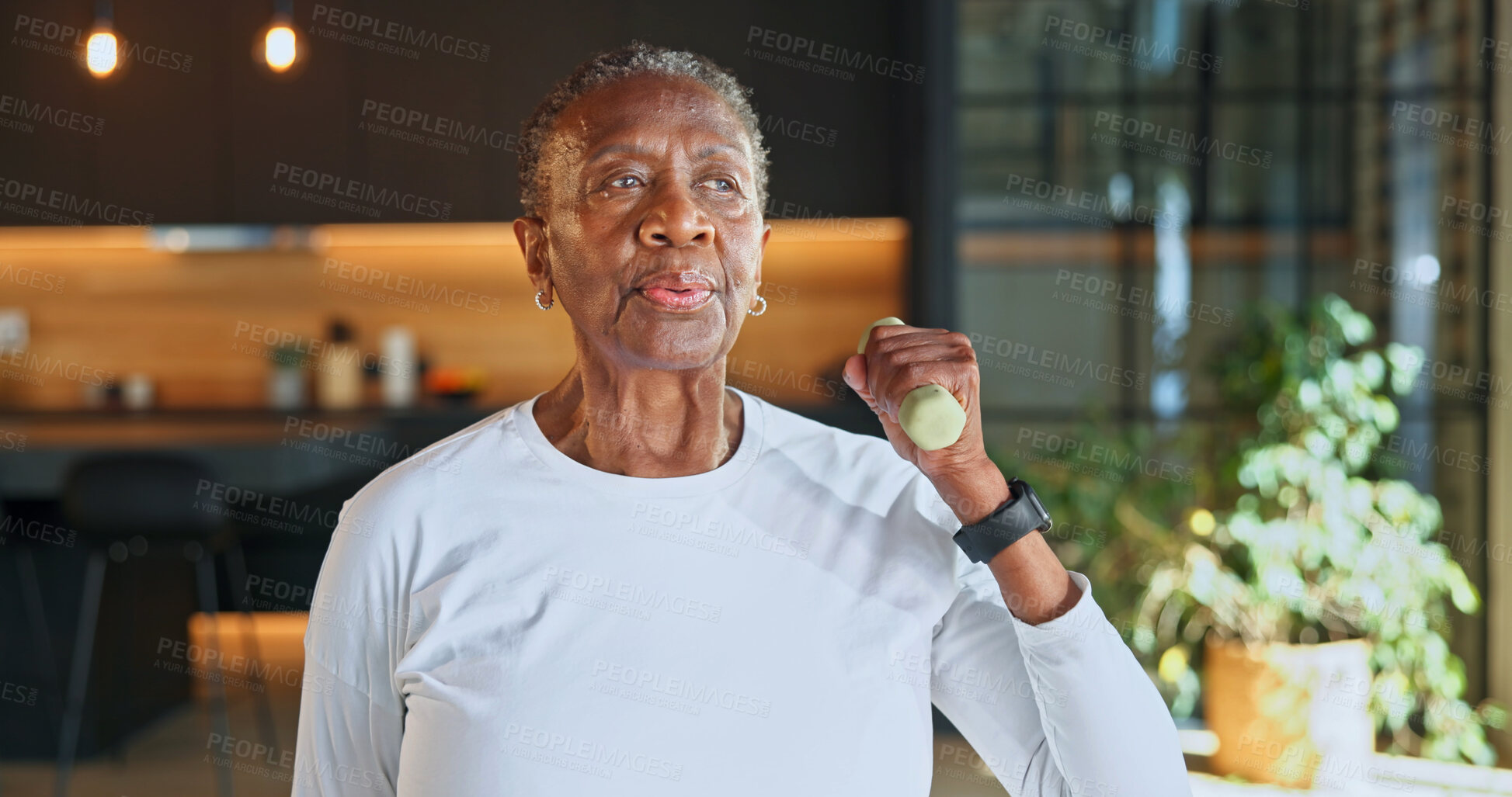 Buy stock photo Exercise, dumbbells and elderly woman in house for muscle growth, osteoporosis prevention or health. Weightlifting, black person and training for wellness, strength development or retirement fitness