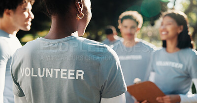 Buy stock photo Volunteer, discussion or team in park with clipboard, task brief or guidance in charity project. Back, people or NGO group with collaboration, coordination or director checklist in outreach program.