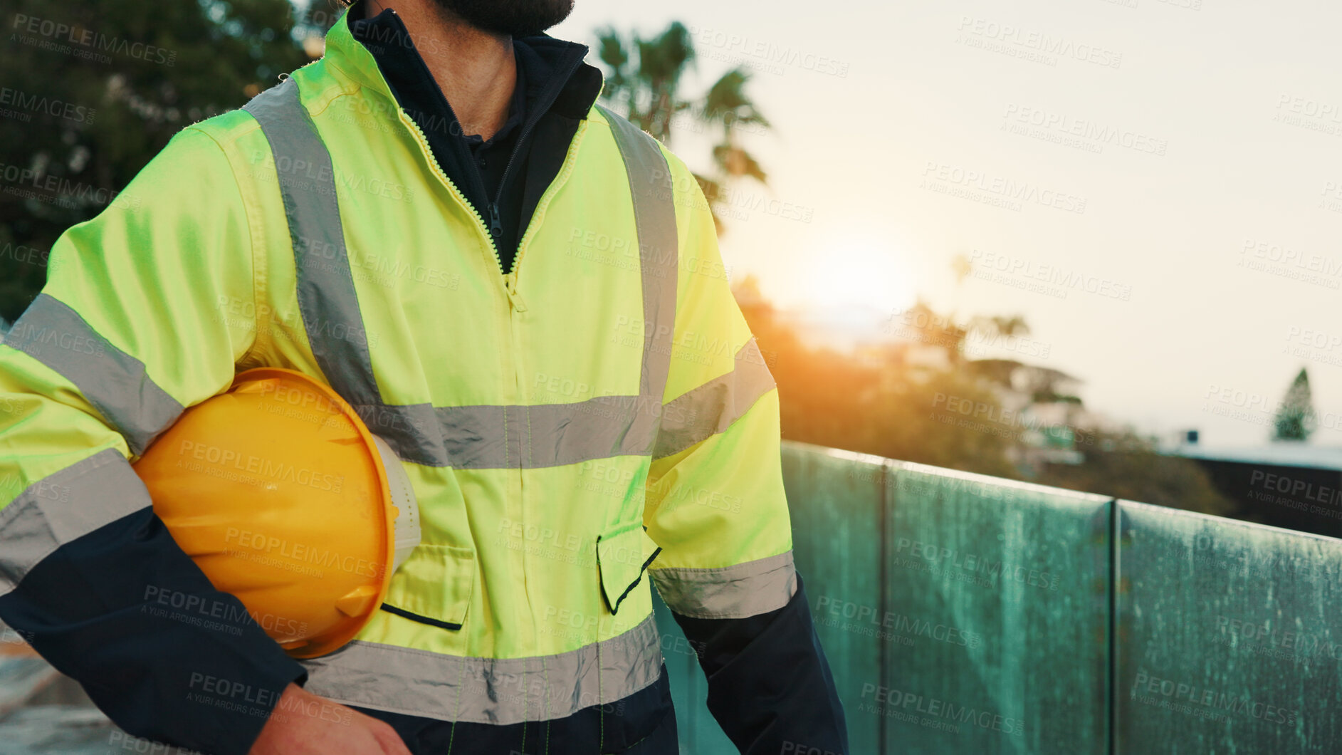 Buy stock photo Man, hands and builder outdoor with helmet, accident prevention and safety compliance for renovation. Construction worker, person and hard hat on balcony for building site protection, rules and PPE.