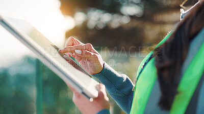 Buy stock photo Construction worker, research and hands with tablet, outdoor and info for renovation project on app. Property development, online and person with tech on building site, scroll and update on website