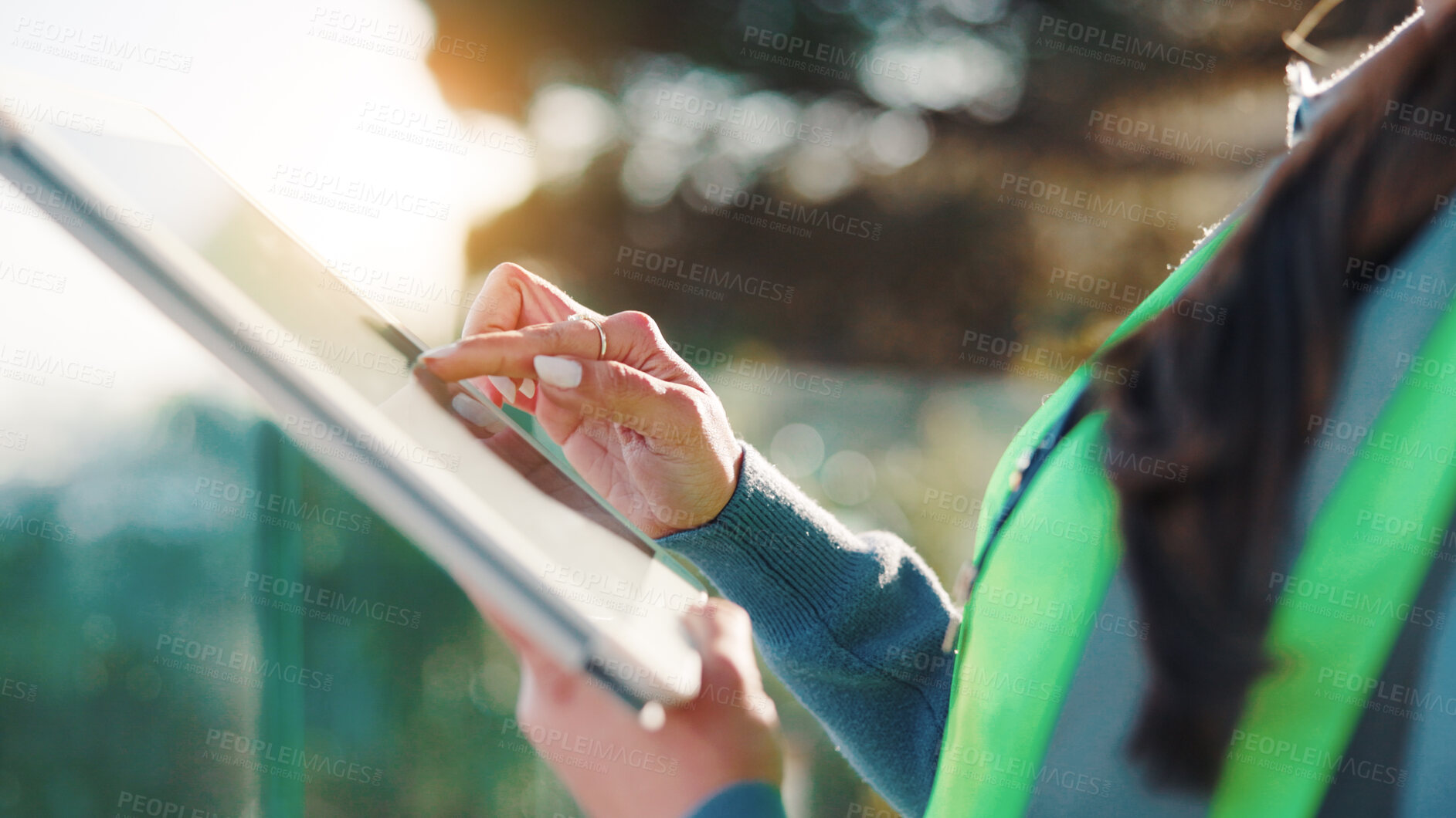 Buy stock photo Construction worker, research and hands with tablet, outdoor and info for renovation project on app. Property development, online and person with tech on building site, scroll and update on website