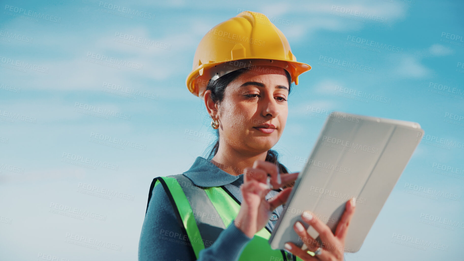 Buy stock photo Woman, engineer and outdoor with tablet for planning, building news or update schedule at space. Worker, tech or connectivity on worksite for design feedback, review or reading compliance regulations
