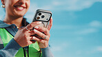 Engineer, hands and outdoor with phone for contact, building planning and update schedule at space. Happy woman, tech or connectivity on worksite for design approval or reading compliance regulations