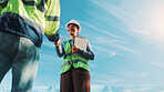 Team, handshake and smile with tablet on construction site, low angle or partnership for renovation. Sky, mockup space and happy people with tech for project, collaboration and property development