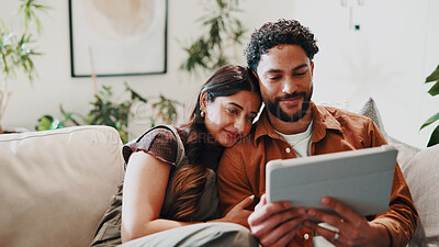 Buy stock photo Couple, relax and tablet in house for connectivity, bonding and quality time with streaming. Happy, together and people cuddle on sofa with technology, film app or network with connection in home
