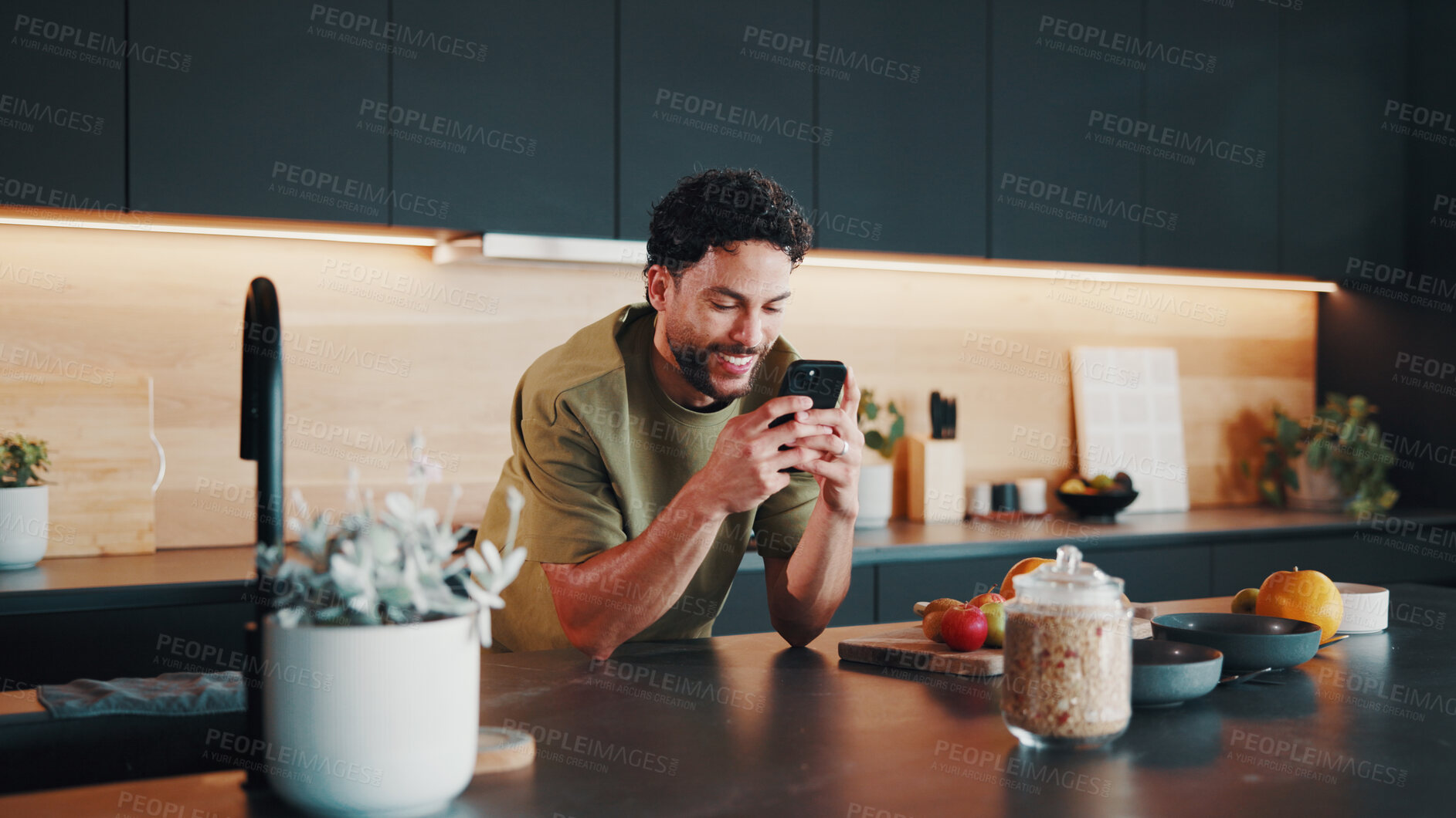 Buy stock photo Recipe, happy or man in kitchen with phone, online instruction or cooking tip in internet search. Digital, nutrition or person in house with tech, food blog or virtual cookbook in culinary activity.