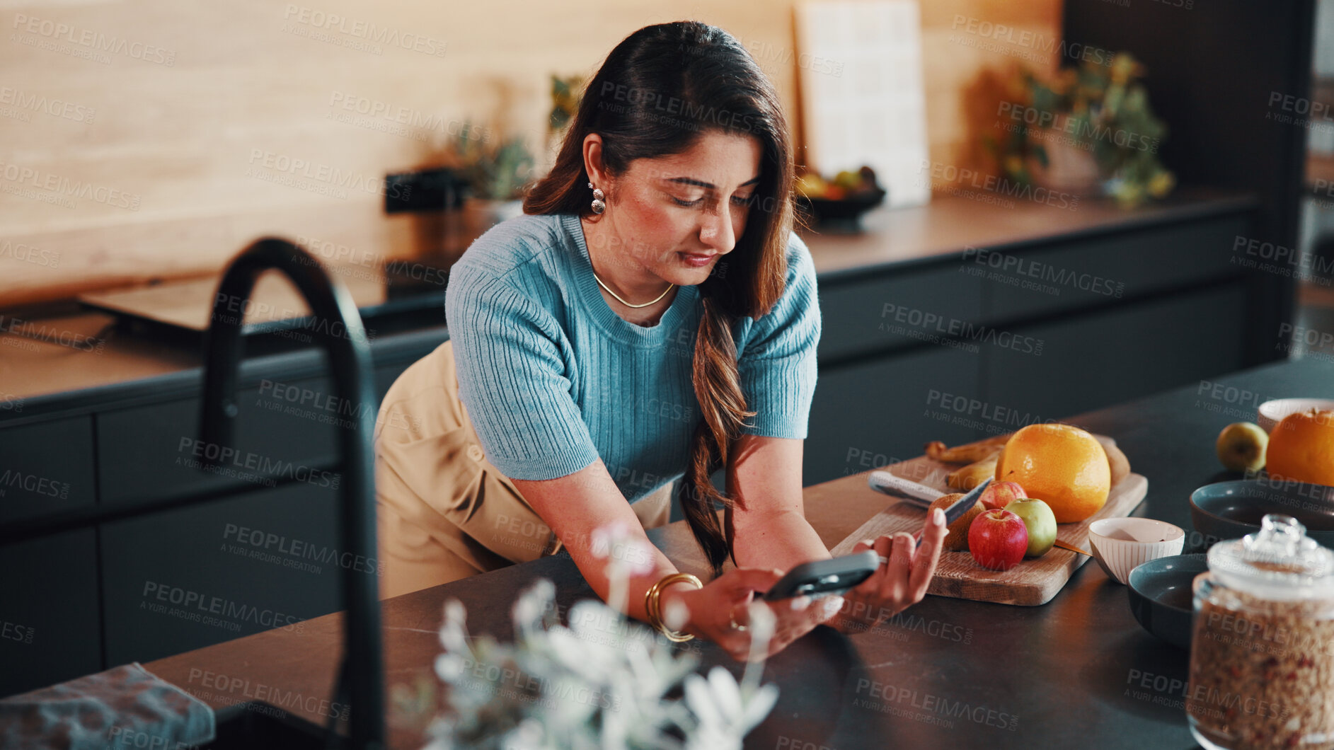 Buy stock photo Woman, phone and credit card in kitchen with ingredients, EFT or payment for meal plan subscription. Morning, person and mobile banking in home with fintech, ecommerce app or online shopping for food
