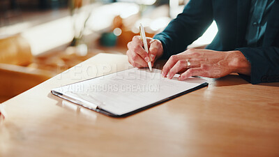 Buy stock photo Hands, man and writing at house with contract, signature and lease compliance for real estate. Male person, consent and legal document on table for agreement, property purchase and rental information