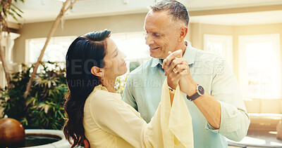 Buy stock photo Dance, holding hands and mature couple at holiday home together for anniversary, bonding or romance. Love, music and smile with married people on summer vacation for connection, support or travel