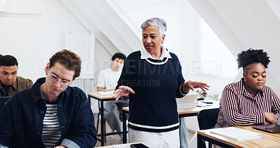 Buy stock photo Education, lecturer or students in class for lecture, exam preparation or learning with technology. Woman teacher, group or lesson in community college for development, upskill training or curriculum