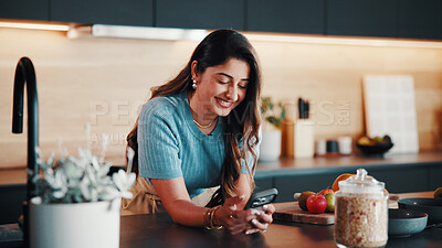 Buy stock photo Recipe, reading or woman in kitchen with phone, online instruction or cooking tip in internet search. Happy, diet or person in house with tech, food blog or virtual cookbook in culinary activity.