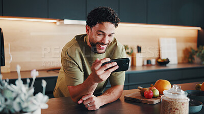 Buy stock photo Recipe, nutrition or happy man in kitchen with phone, digital lesson or cooking tip in meal prep. Smile, food or person in home with tech, online instruction or virtual tutorial for culinary activity