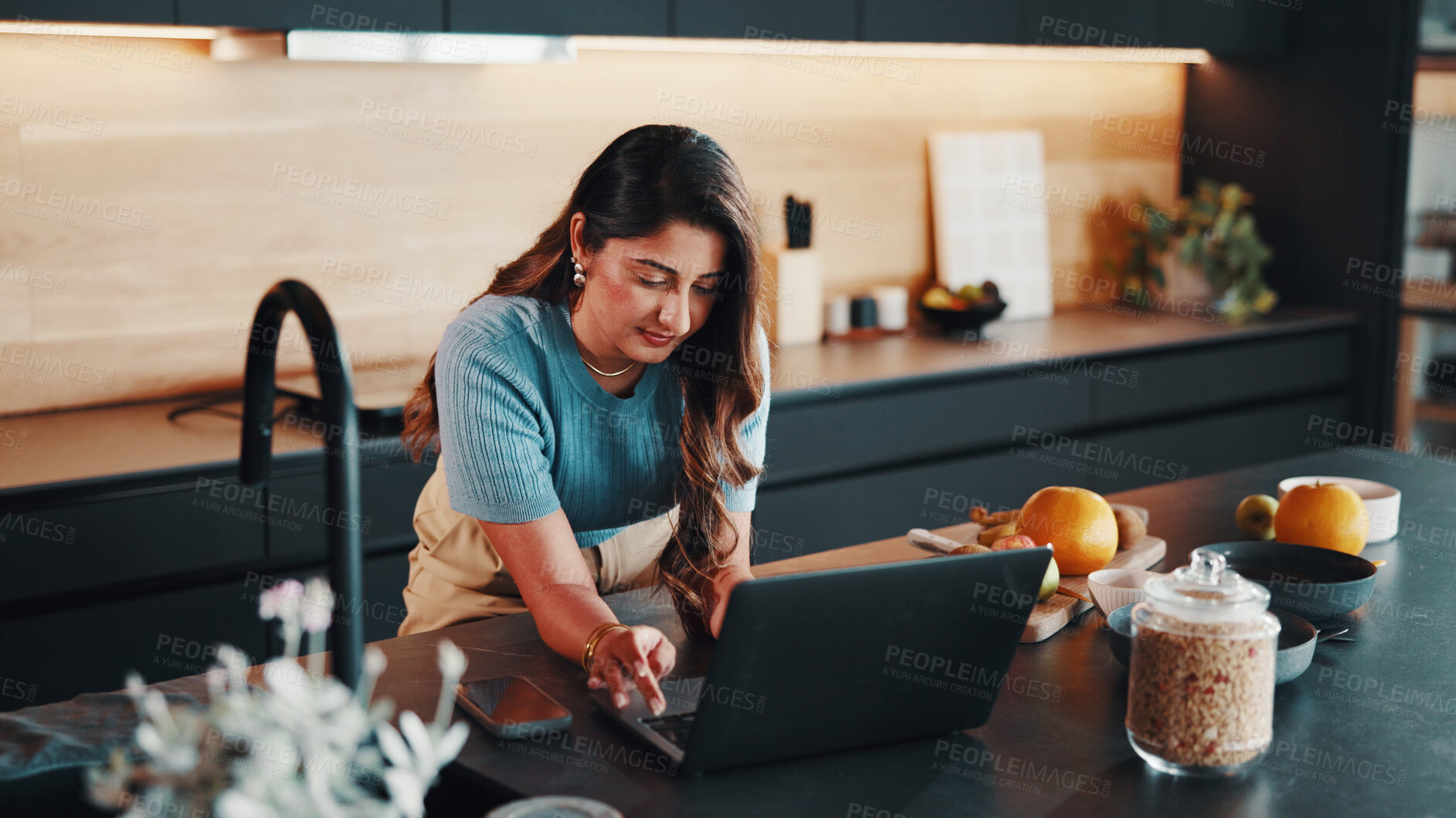 Buy stock photo Man, typing and meal prep in kitchen with laptop, food blog or search online tutorial for breakfast. Person, browsing and ingredients in home with computer, healthy recipe and planning in morning.