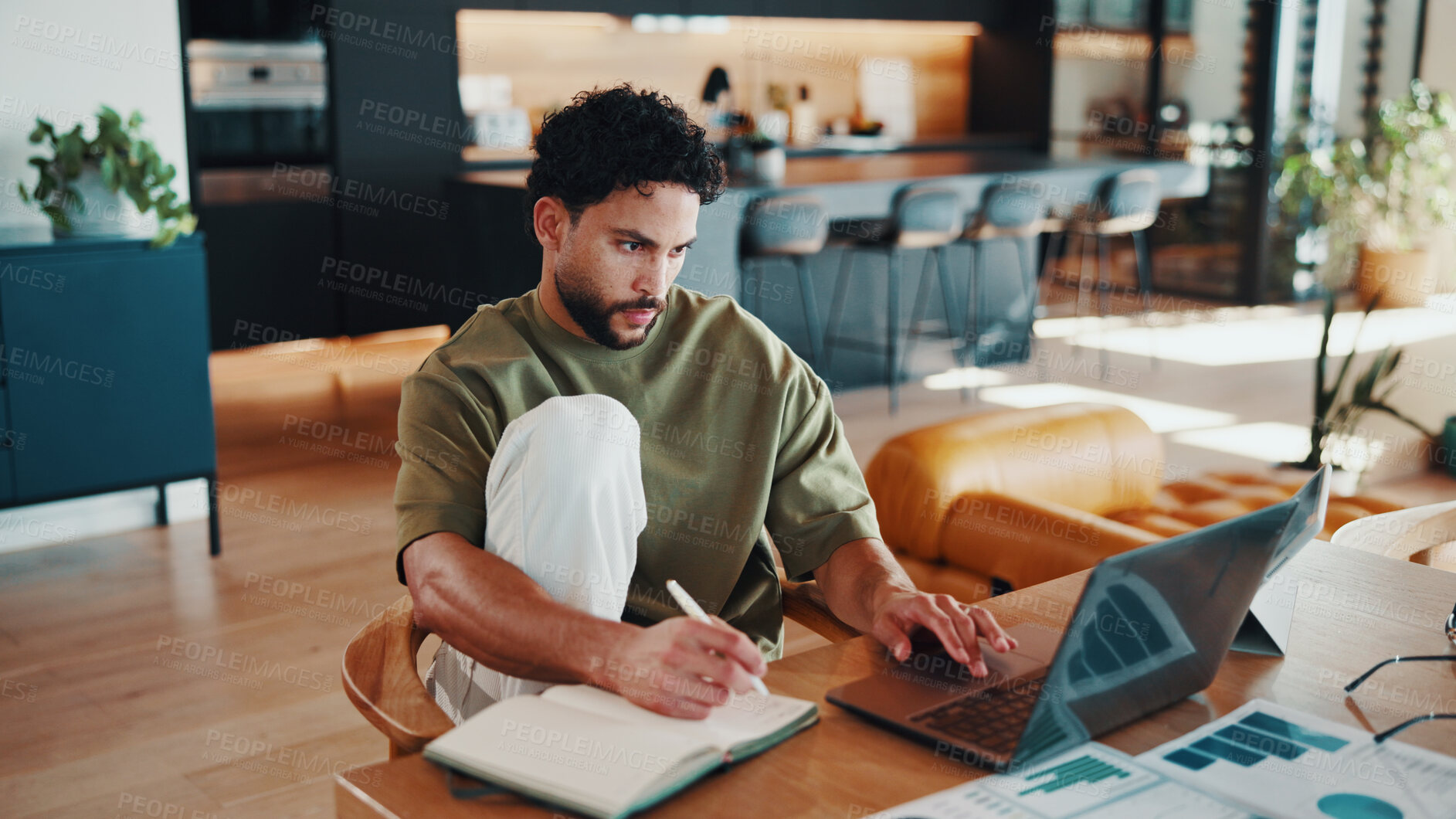 Buy stock photo Man, notebook and remote work in house with laptop, data analytics and review financial performance. Freelance analyst, person and research in home with computer, graphs and stats for finance audit.