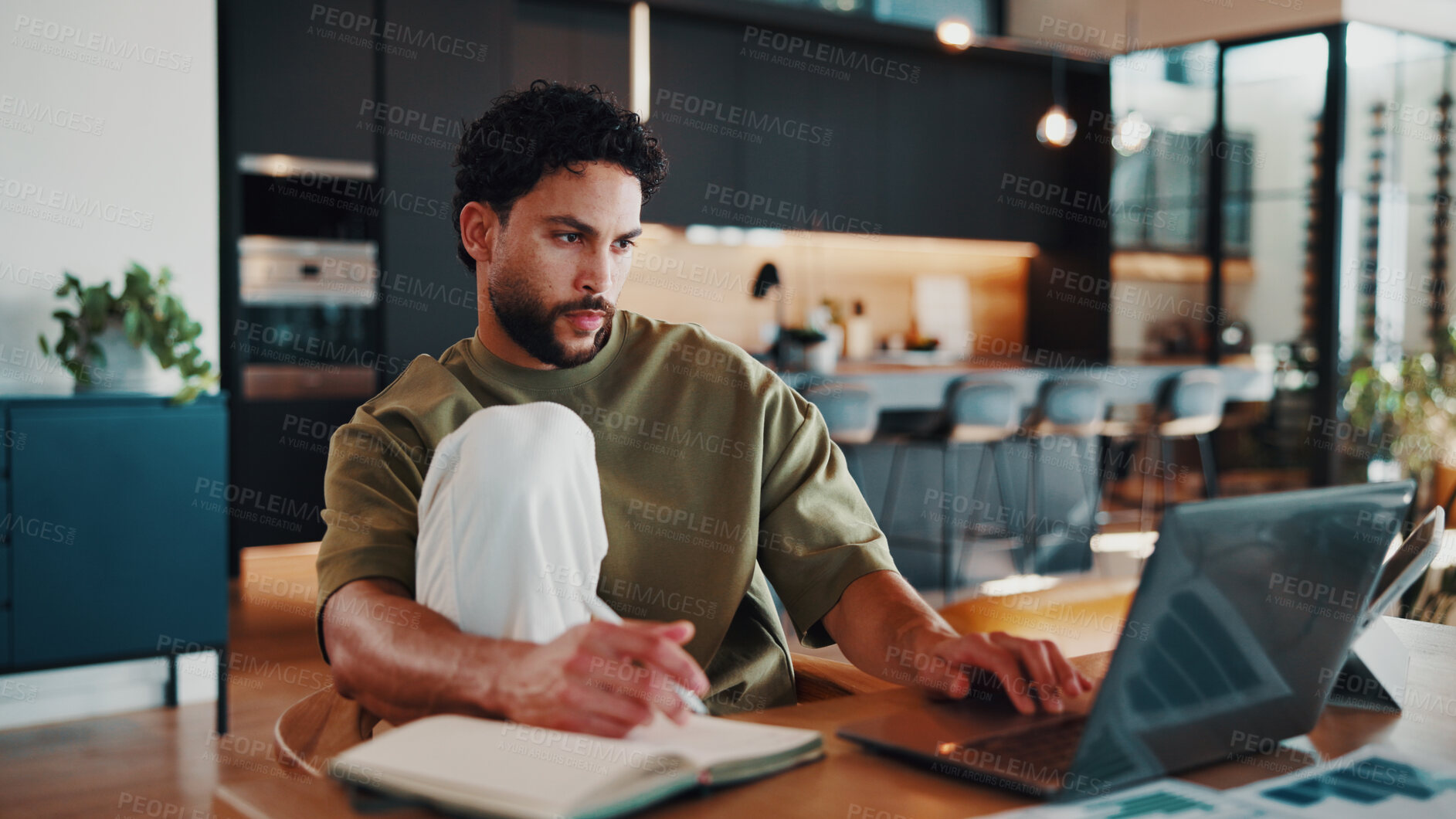 Buy stock photo Man, notebook and remote work in home with laptop, data analytics and review financial performance. Freelance analyst, person and research in house with computer, graphs and stats for finance audit.