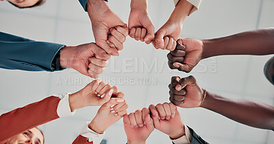 Buy stock photo Fist bump, circle and team of business people in office for solidarity, connection or networking. Celebrate, group and corporate employees with hands together for good news or achievement from below.