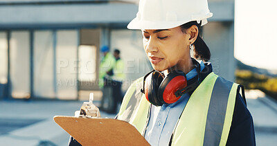 Buy stock photo Woman, architect or checklist with clipboard on construction site for building inspection or safety. Female person, contractor or civil engineer taking notes for architecture maintenance or security