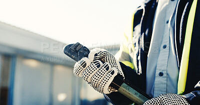 Buy stock photo Hands, wrench and worker at site for construction, property development and ready for renovation. Person, safety gloves and tool for building maintenance, manual labor and start project outdoor