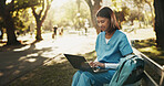 Laptop, medical student and woman at park for learning, research or course module assignment. Computer, happy person and healthcare trainee on bench outdoor, education review or nurse typing report