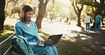 Laptop, medical student and woman at park for education, research feedback or course module report. Computer, happy person and trainee nurse on bench outdoor, learning or typing healthcare review
