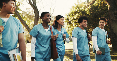Buy stock photo Friends, smile or nursing student outdoor with walking, connection or support in medical education. Companion, interns or people with stroll, bonding together or group unity in healthcare residency