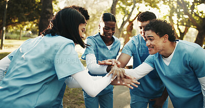 Buy stock photo People, nurse and medical team with hands together in park for nursing charity, help or mission. Group, friends or healthcare volunteers piling for health outreach or community service in nature