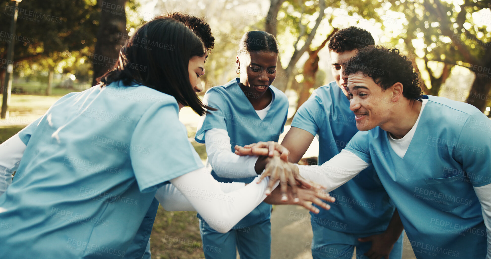 Buy stock photo People, nurse and medical team with hands together in park for nursing charity, help or mission. Group, friends or healthcare volunteers piling for health outreach or community service in nature