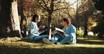 Buy stock photo Nursing, friends or student outdoor with books, peer research or exam knowledge in medical education. Happy, man or woman with technology, study support or literature revision in healthcare residency