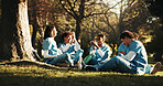 Nurse, medical students and applause for success outdoor, exam milestone or residency achievement. People, friends and clapping at park with healthcare learner for celebration, excited and support