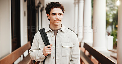 Buy stock photo Thinking, man and student at campus with smile, exchange program and scholarship for education. Thoughts, male person and vision at university with backpack, start semester and learning for knowledge