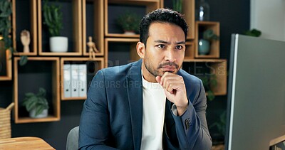 Buy stock photo Man, reading and thinking in office with computer, research and serious consideration for investment. Investor, person and problem solving with pc, online website and decision for business venture.