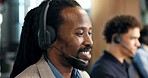 Call center, team and happy man with headset, listening or discussion for lead generation in office. Telemarketing, people and consultant with smile, coworking and communication with mic in business