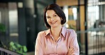 Creative, portrait and happy woman with arms crossed in office, public relations and career growth. Employee, smile and mature person with pride for opportunity, brand manager or business development