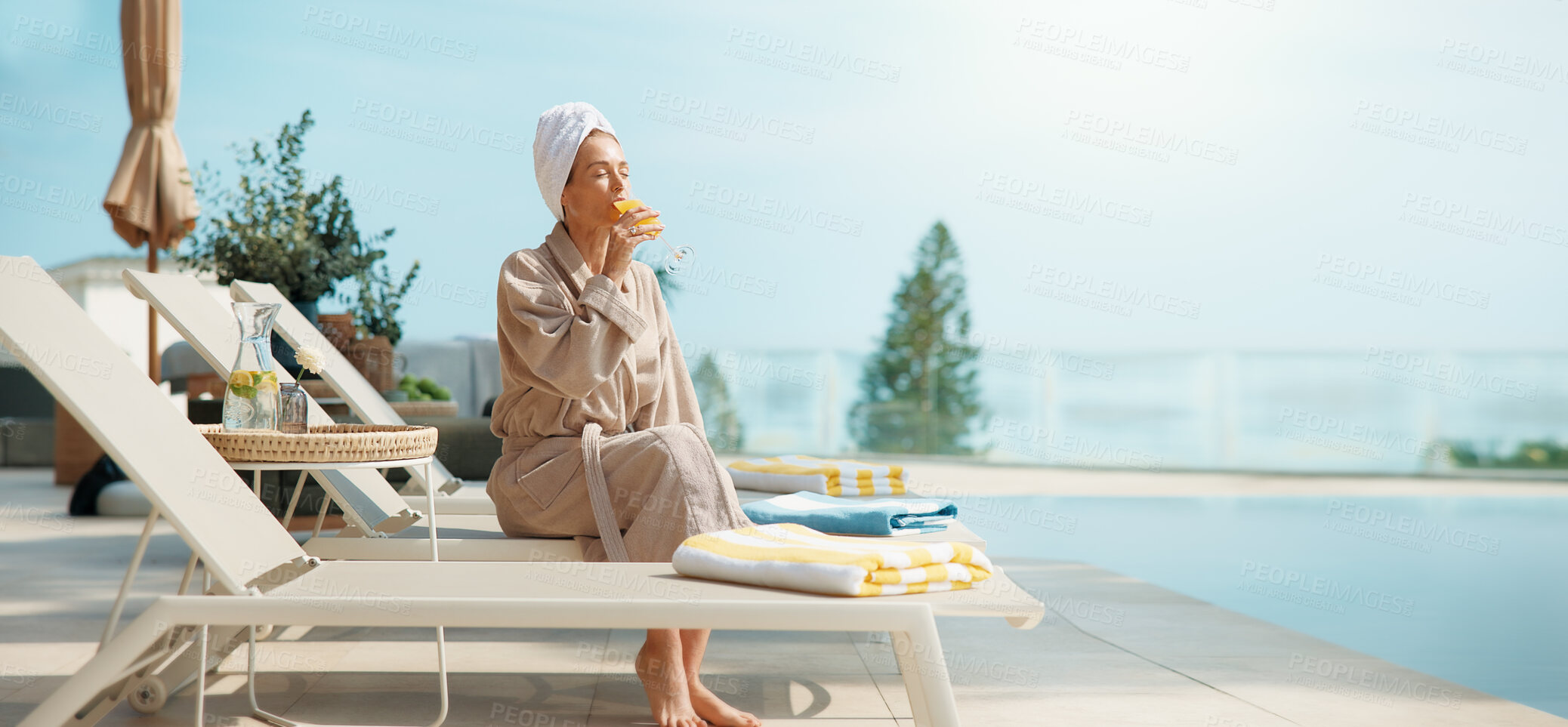 Buy stock photo Chair, hotel and woman with drink by pool for vacation, luxury getaway and holiday on weekend. Hospitality, travel and mature person with mimosa, towel and juice for tourism, relax or break at resort