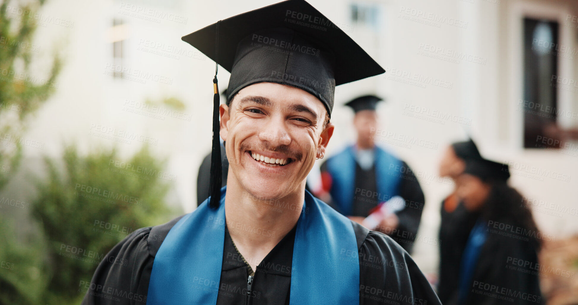 Buy stock photo Happy, portrait and man on campus for graduation, academic ceremony and success at college. Graduate, education and person at university for studying, achievement and milestone for scholarship