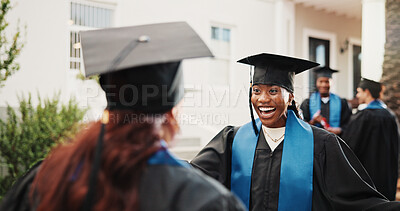 Buy stock photo Excited, students and hug at campus for graduation, event and congratulations for degree completion. Smile, women and embrace graduate with college diploma, accolade award and learning accomplishment