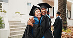 Woman, students and hug outdoor for graduation, event and congratulations for degree completion. Smile, friends and embrace graduate with college diploma, accolade award and learning accomplishment