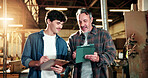 Carpenter, people and talk in workshop with tablet, timber manufacturing and checklist for project. Manager, team and discussion in factory with tech, lumber production plan and clipboard for notes.