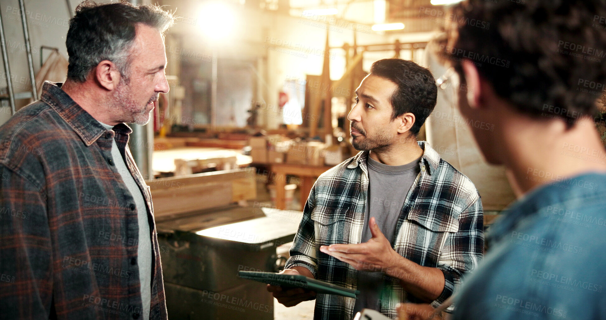 Buy stock photo Woodwork, manager and meeting in workshop with tablet, explain furniture design or carpentry project. Boss, people and conversation in warehouse with tech, carpenter advice or plan for manufacturing.