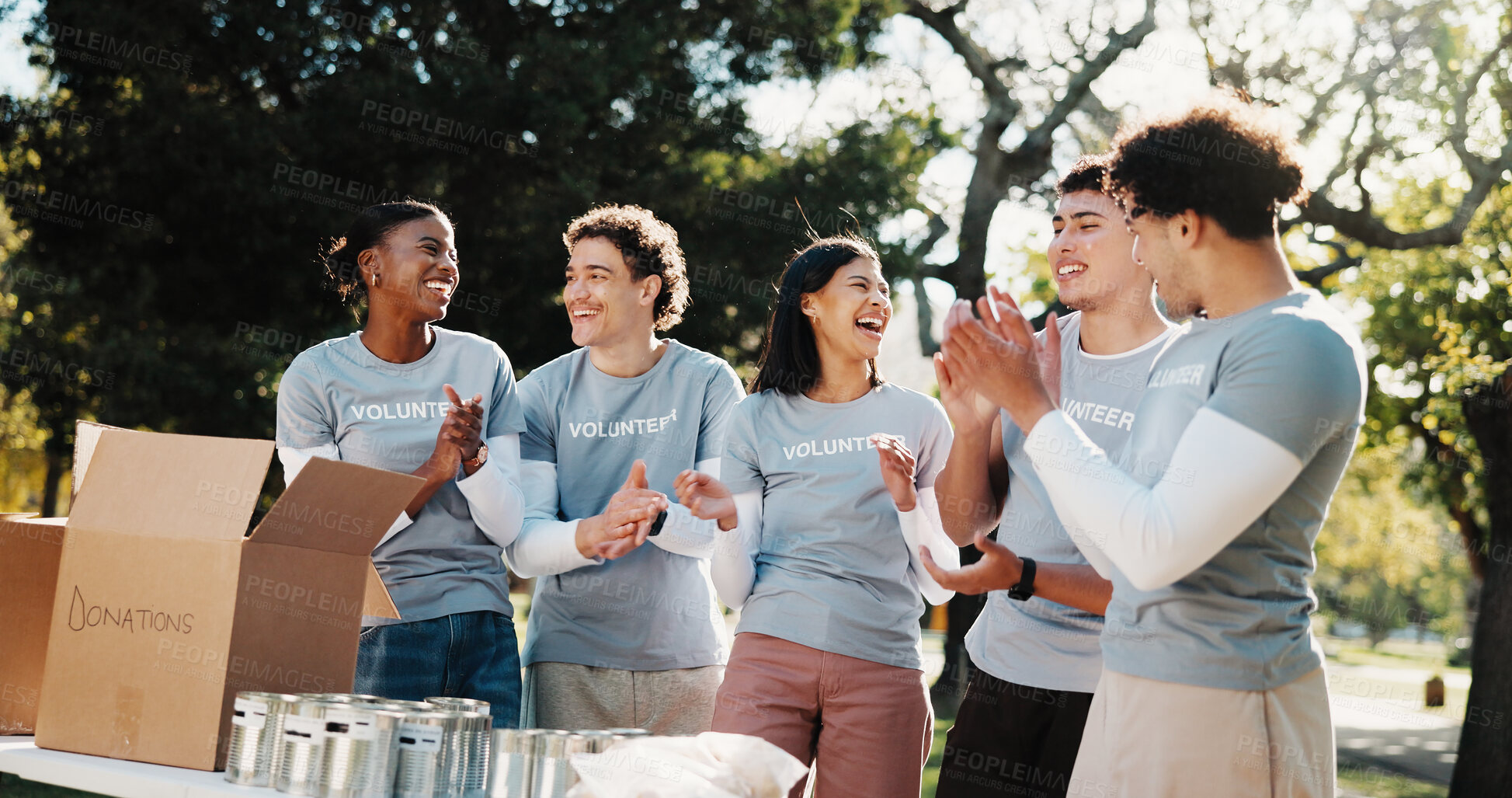 Buy stock photo Group, volunteer and winning with applause in park for outdoor outreach, donation or charity. Happy people, activist or NGO team clapping with smile for success, community service or achievement