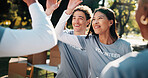 Volunteer, group and park with high five for outreach success, charity or winning together in nature. Happy, NGO team or people with smile for achievement, community service mission, support or unity