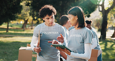 Buy stock photo Volunteer, tablet and people with clipboard for talking, planning and grocery list for donation. Outdoor, tech and woman with team, checklist and inventory for food drive, aid and charity outreach