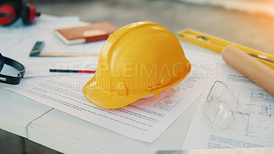 Buy stock photo Helmet, construction and paper with blueprint with documents for building, tools or expansion. Architecture, infrastructure engineering or renovation with floor plan for property developer or project